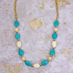 Turquoise and white stone bead necklace mixed with white wood and gold beads